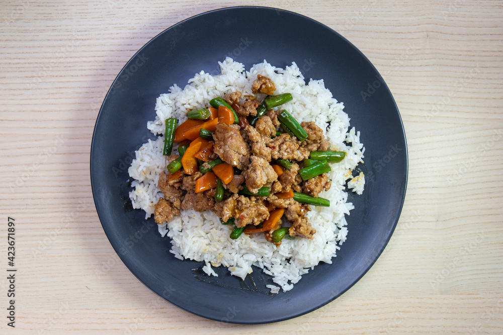 Mince meat and green bean over steam rice. Mince meat and green bean over steam rice.