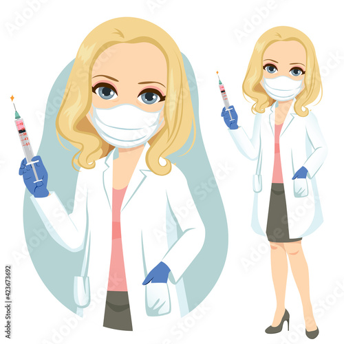 Female senior doctor wearing white lab coat holding Covid-19 vaccine