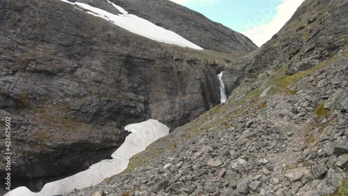 Static shot of the famous waterfall, Silverfallet, near Kebnekaise, Sweden. photo