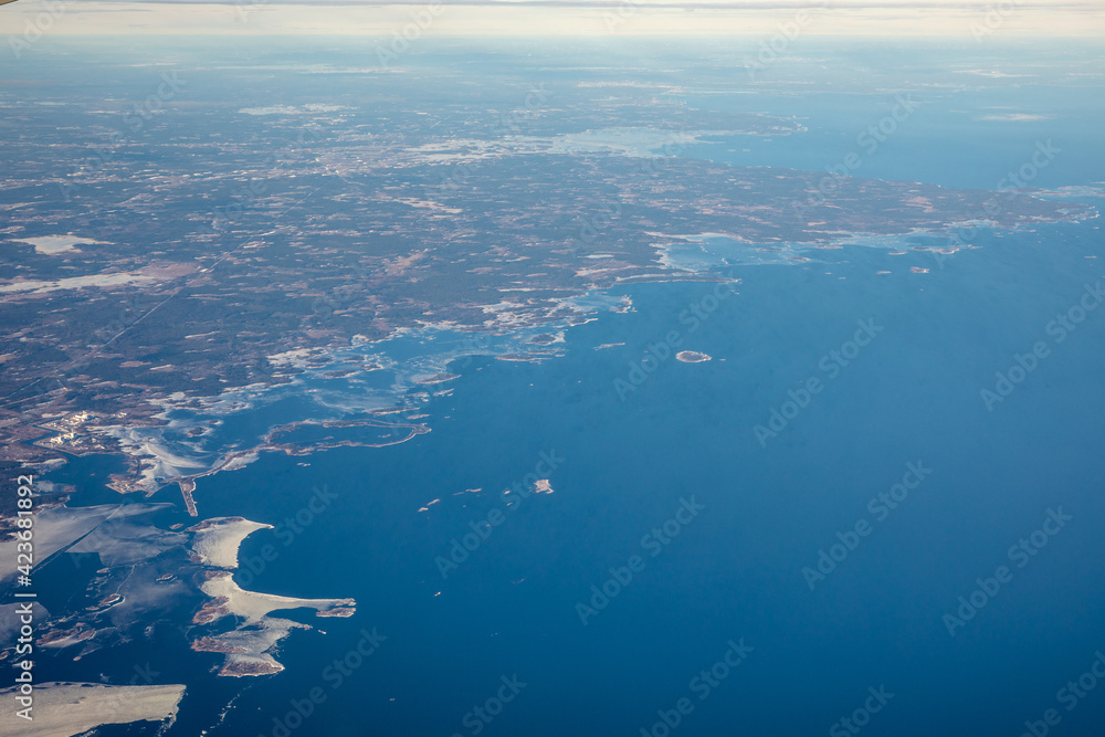 View from the plane on the winter scenery of Sweden.