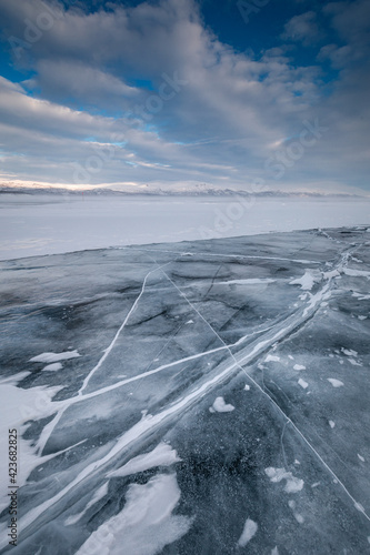 The frozen lake Torneträsk in Swedish Lapland. Beautiful ice forms create an amazing sight.