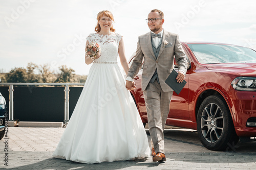 Bridal couple walking together as husband and wife