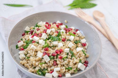 healthy spring salad with asparagus, barley and cheese