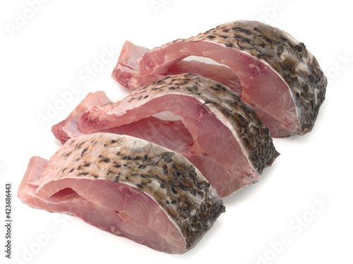 Carp steaks on white background, close up