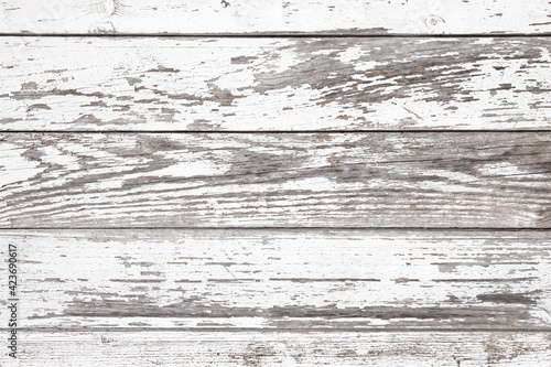 Fototapeta Naklejka Na Ścianę i Meble -  Aged white wooden background texture. Wood paneling with cracked an peeled paint