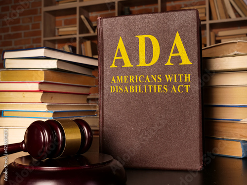 Photos Gavel and Americans with Disabilities Act ADA book with documents