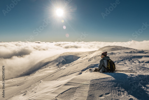 tourist resting in the snowy mountains