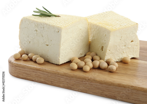 Pieces of delicious tofu with rosemary and soy on white background
