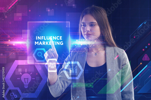 Business, Technology, Internet and network concept. Young businessman working on a virtual screen of the future and sees the inscription: Influence marketing