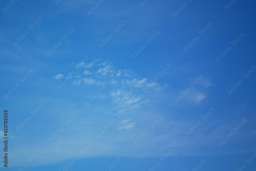 Blue sky with fluffy clouds. Heavenly landscape with white clouds. Blue sky with fluffy clouds. Heavenly landscape with white clouds.