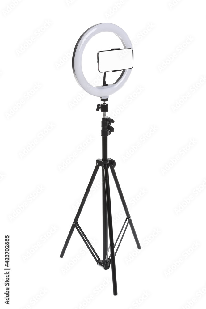 Obraz premium Modern tripod with ring light and smartphone isolated on white