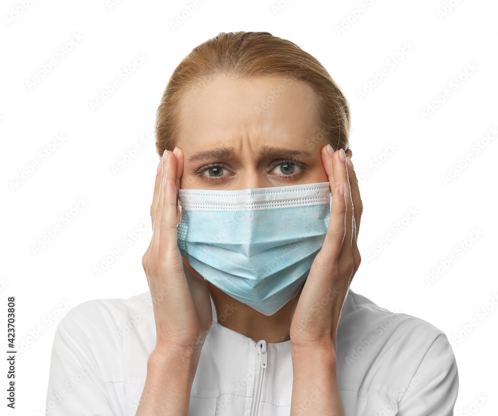 Doctor with protective mask feeling fear on white background Doctor with protective mask feeling fear on white background