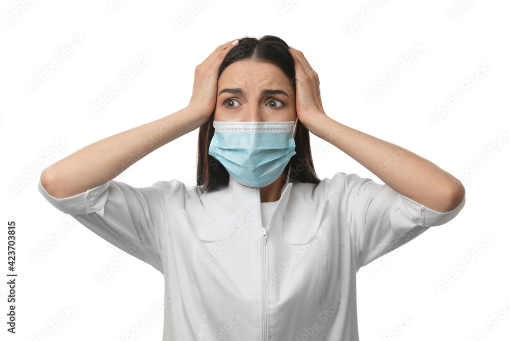 Doctor with protective mask feeling fear on white background Doctor with protective mask feeling fear on white background