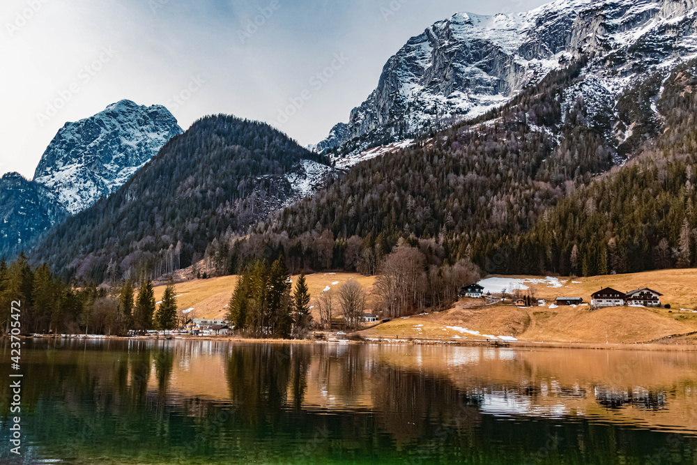 Beautiful winter landscape with reflections at the famous Hintersee, Ramsau, Berchtesgaden, Bavaria, Germany with the Reiteralm summit in the background