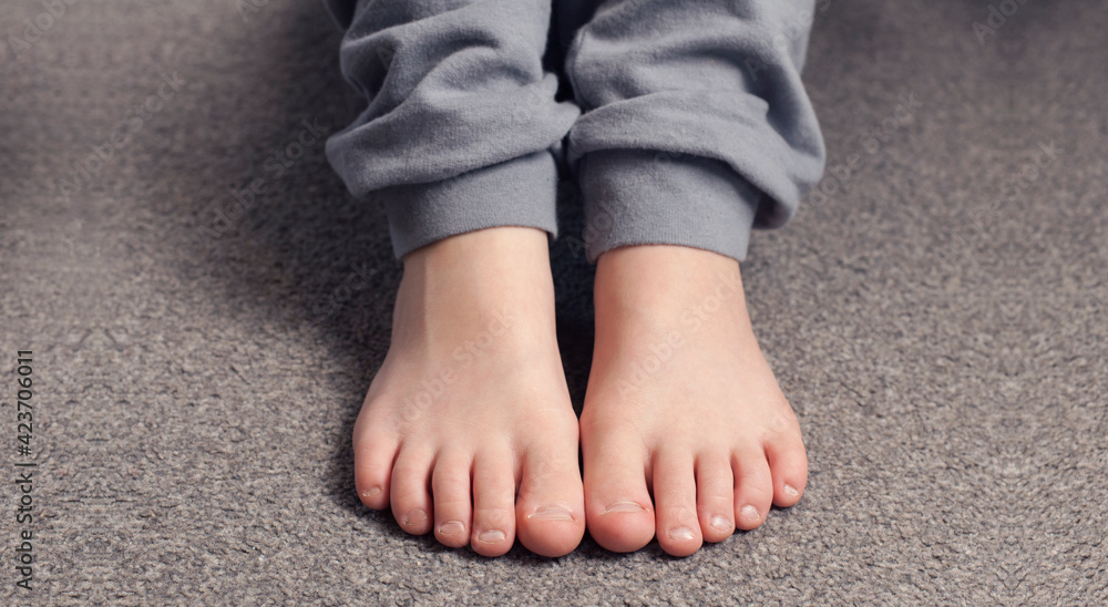Child's bare feet. Heel and foot. Toes Child's bare feet. Heel and foot. Toes