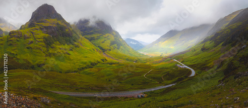 Tableau sur toile Atmospheric panorama vista view of the Three Sisters of Glencoe valley mountain landscape in the Scottish Highlands, Scotland