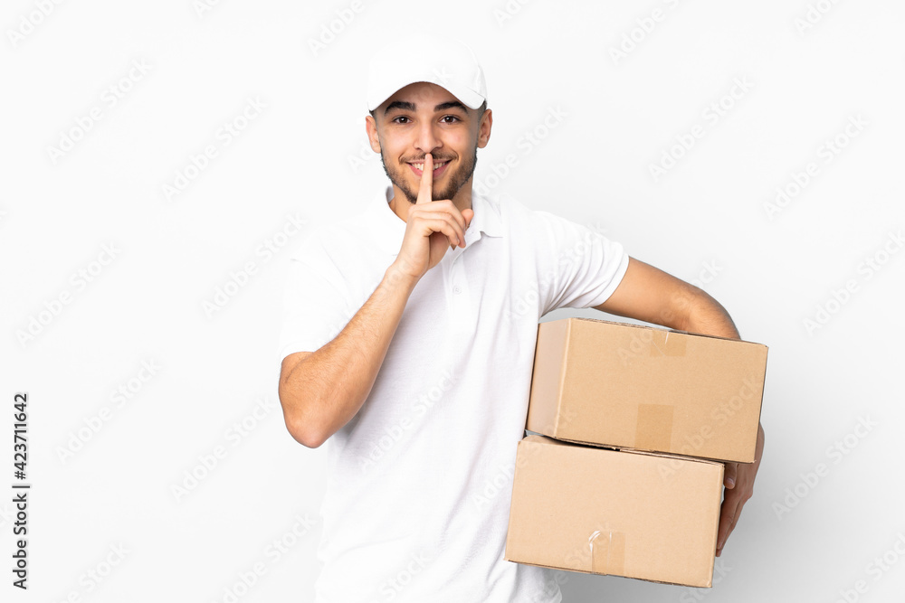 Delivery Arabian man isolated on blue background doing silence gesture Delivery Arabian man isolated on blue background doing silence gesture