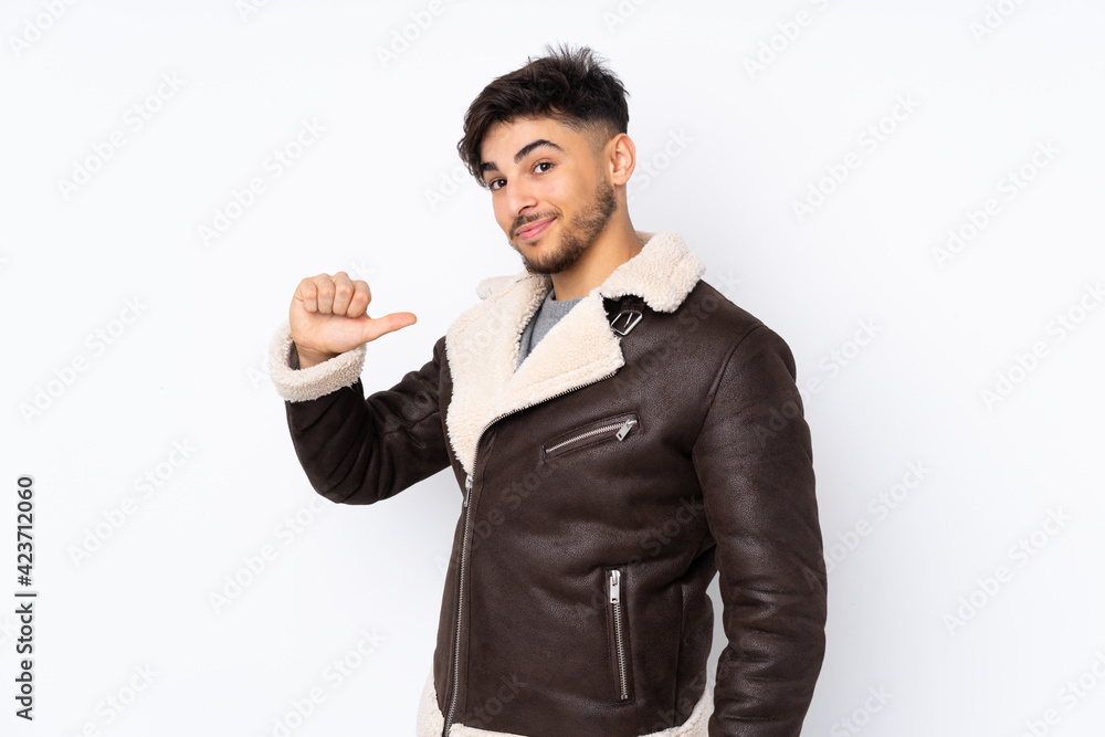 Arabian handsome man over isolated background proud and self-satisfied Arabian handsome man over isolated background proud and self-satisfied