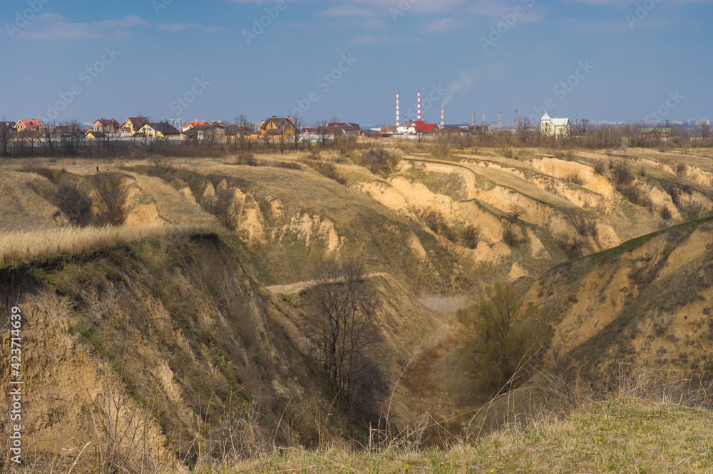 Early spring landscape with sandy ravines in outskirts of Dnipro city, Ukraine