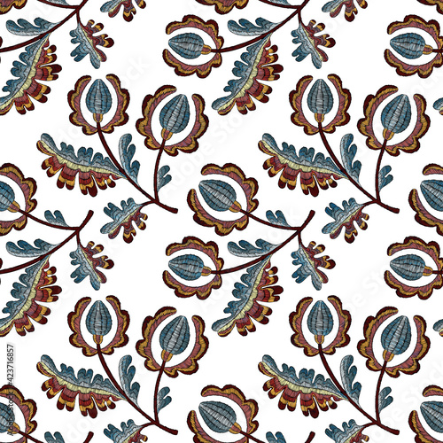 Embroidered seamless pattern. Isolated branches of flowers on a white background. Bohemian print for textiles and home decor. Vector illustration.