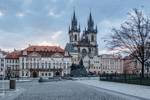 Old Town Square,Prague,Czech Republic. Empty city during lockdown.Historical, gothic style buildings at sunrise.Famous unesco heritage place. Church of Our Lady,before Tyn, picturesque urban scene.