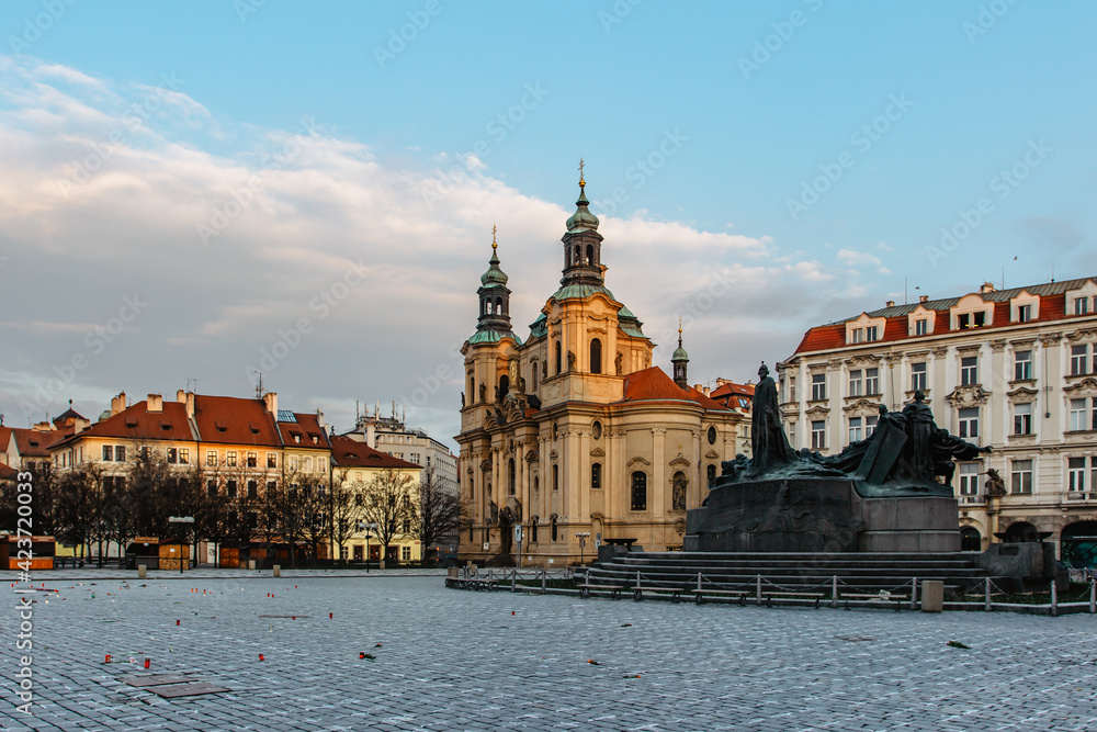 Fototapeta premium 25 000 crosses on Old Town Square as memory of COVID-19 virus victims.Life in pandemic.Empty city during lockdown.Historical, gothic style buildings at sunrise.Famous place unesco heritage square