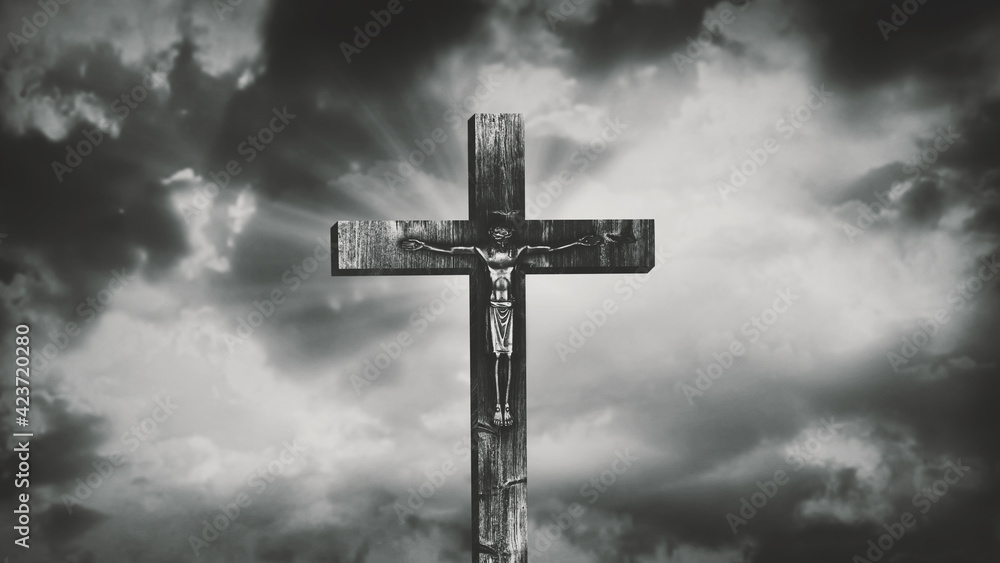 Jesus Christ crucified at Golgotha hill outside ancient Jerusalem. The crucifixion of Christ with stormy clouds in the sky. Vintage film look