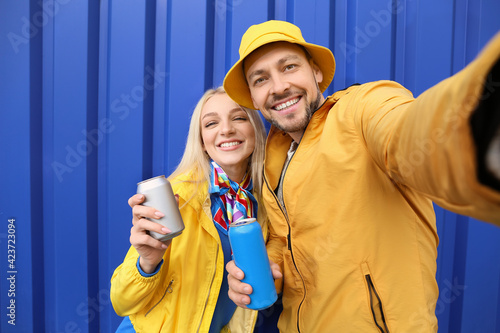 Young couple with soda taki...