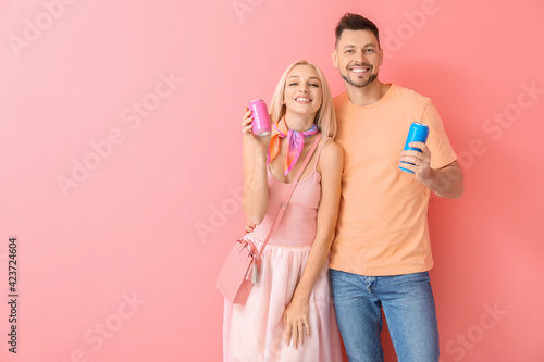 Couple with soda on color b...