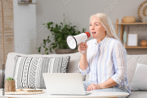 Screaming mature woman with...