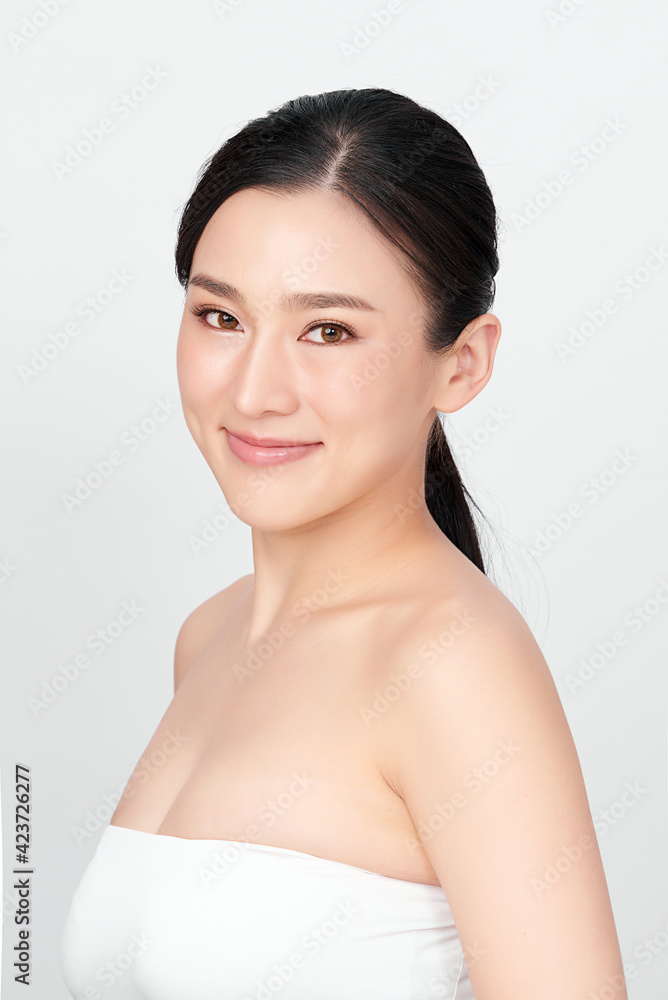 Beautiful young asian woman with clean fresh skin on white background, Face care, Facial treatment, Cosmetology, beauty and spa, Asian women portrait Beautiful young asian woman with clean fresh skin on white background, Face care, Facial treatment, Cosmetology, beauty and spa, Asian women portrait