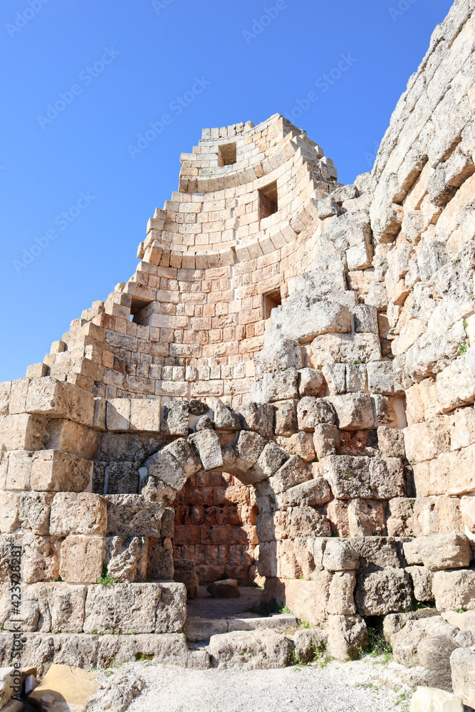 Ruined hellenistic city gate in the ruins of the ancient city Perge, near Antalya, Turkey