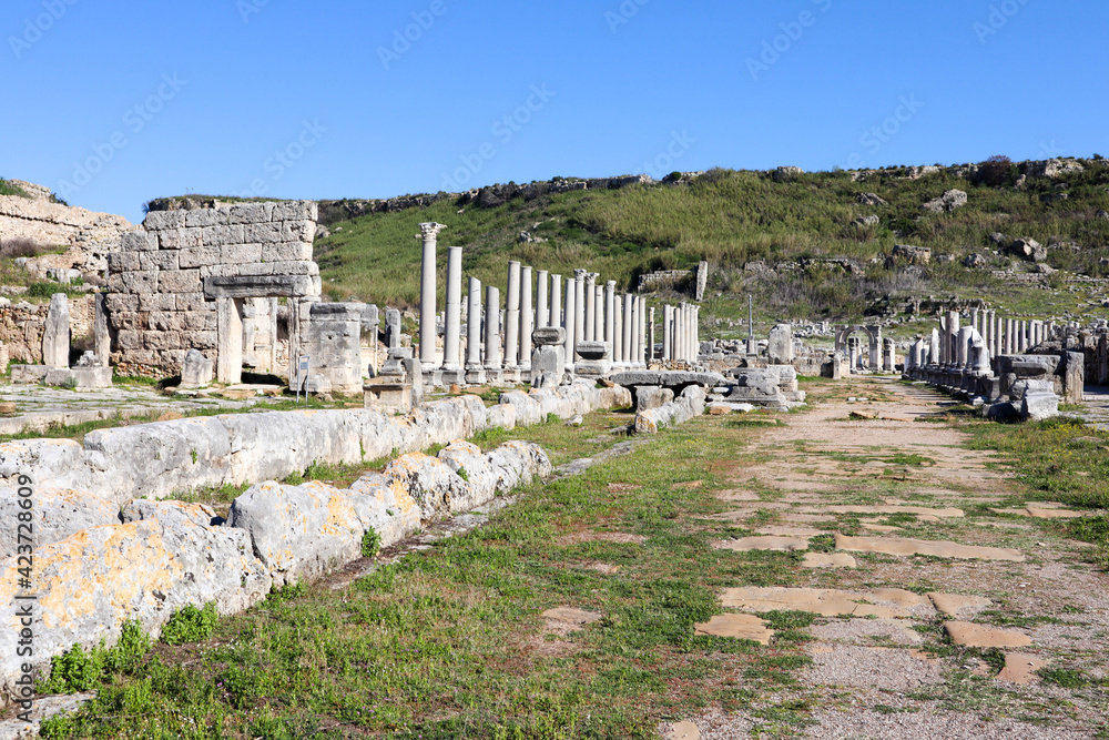 beautiful colonnade on the street of ancient ruined city Perge, near Antalya