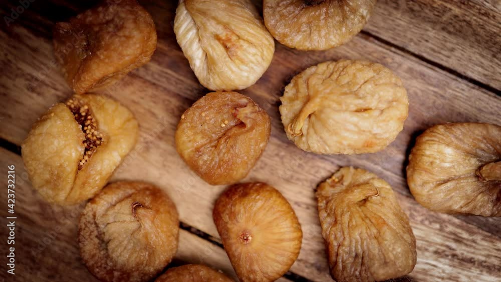 Dried figs on a wooden board - studio photography Dried figs on a wooden board - studio photography