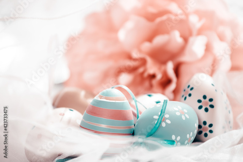 Colorful easter eggs in pastel colors with copy space.