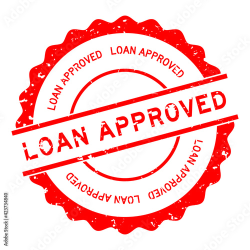 Grunge red loan approved word round rubber seal stamp on white background