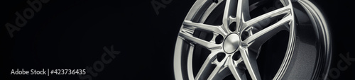 Alloy wheel in silver color in the shape of a star. long layout for the site header, autotuning details