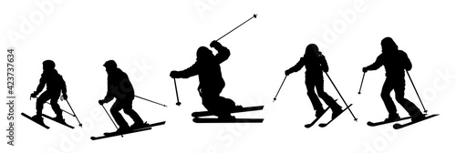 Different people skiing vector silhouette.