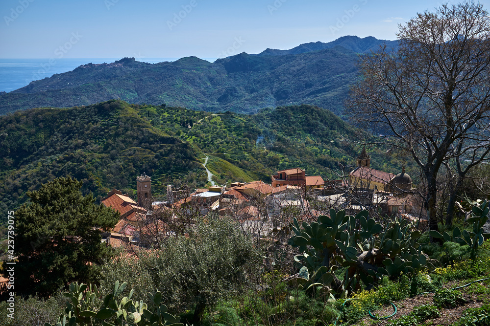 town perched on the slopes of the Peloritan mountains in Sicily town perched on the slopes of the Peloritan mountains in Sicily