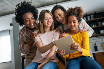 Multiethnic diverse happy family with children at home