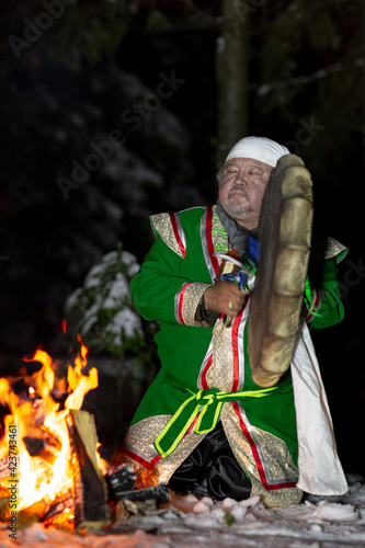 the shaman performs the ritual at night by the fire with a tambourine. Shamanism and ethnoculture of the peoples of Mountain Shoria and Altai. the real moment of the sorcerer's work with spirits