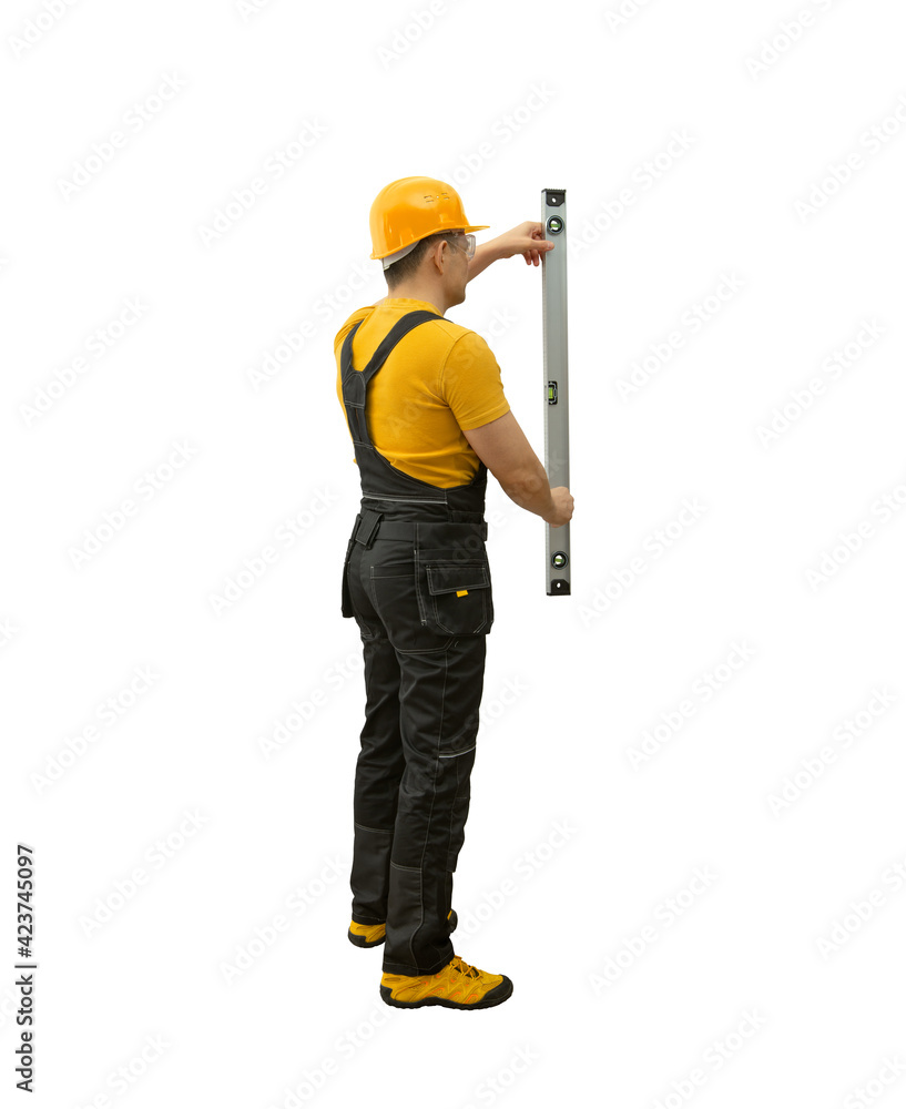 worker handyman repairman or builder with construction spirit level