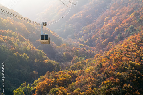 Famous cable car and autumn foliage scenery in Miryang, South Korea. photo