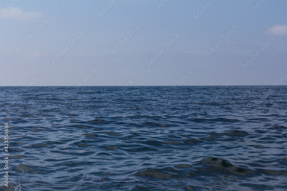 Seascape, blue sky, clouds and sea in the tropical waters Seascape, blue sky, clouds and sea in the tropical waters