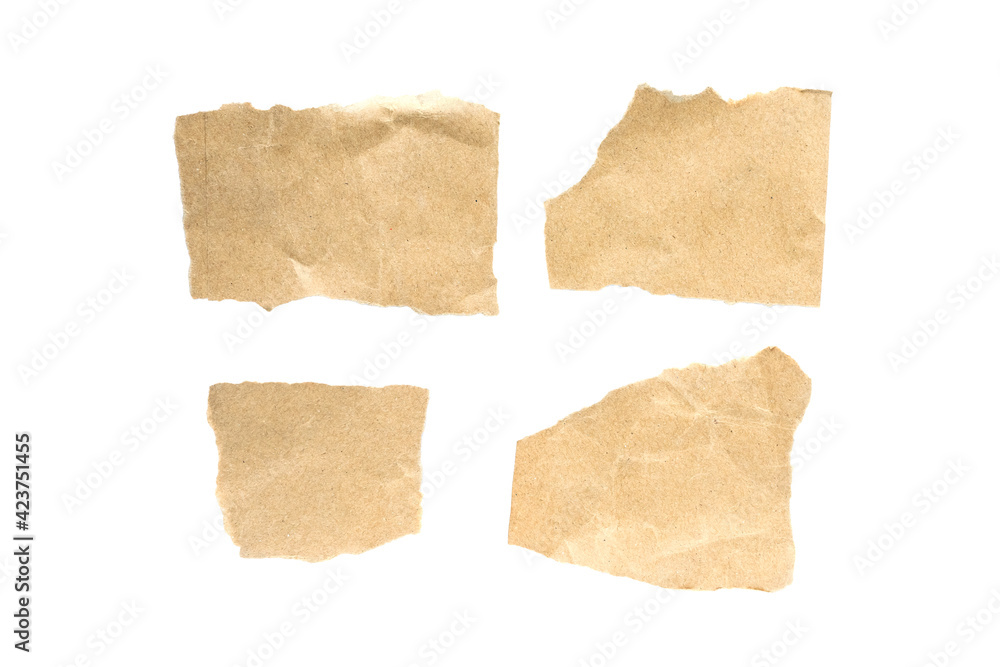 Recycled paper craft stick on a white background. Brown paper torn or ripped pieces of paper isolated on white background. Recycled paper craft stick on a white background. Brown paper torn or ripped pieces of paper isolated on white background.