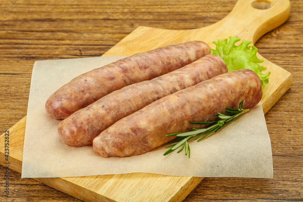 Raw pork meat sausages for grill Raw pork meat sausages for grill