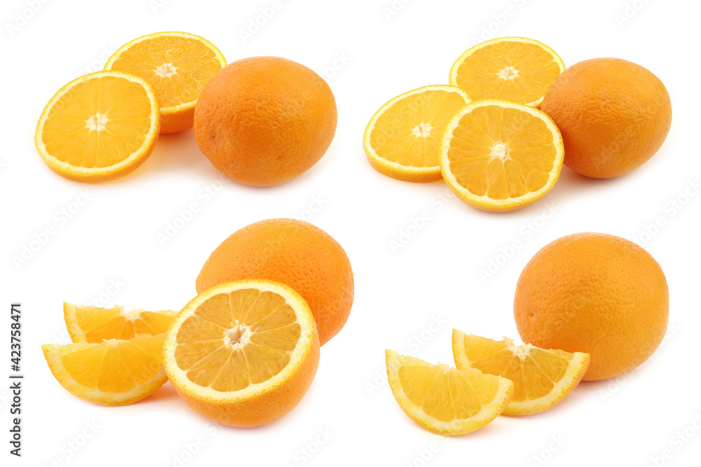 Fototapeta premium fresh oranges and some cut pieces on a white background