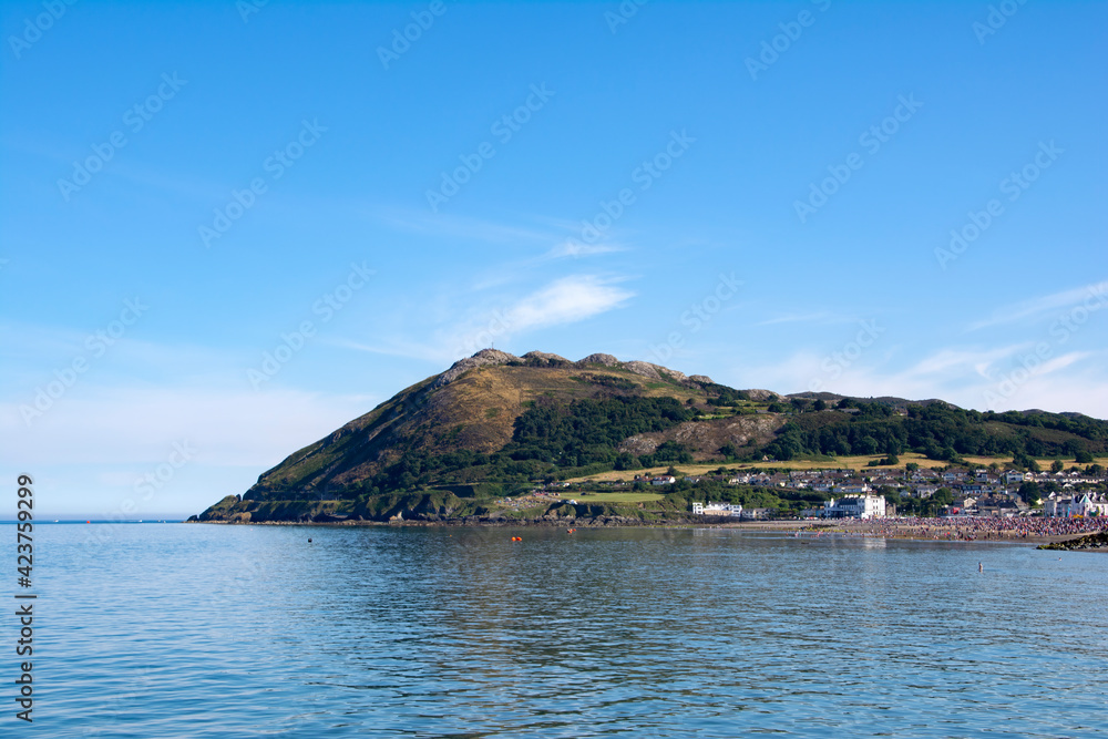 A view of Bray head and the busy coastline during summer.