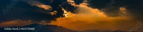 sun behide the cloud with sunset for background © surawach5