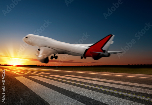 Bilde på lerret Modern white airplane landing on runway